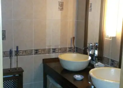 Venta de piso de tres dormitorios, garaje y trastero en el centro en Manzanares